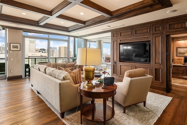 living room featuring crown molding, beam ceiling, baseboards, coffered ceiling, and hardwood / wood-style floors