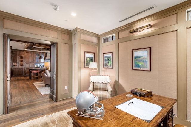 home office with recessed lighting, dark wood finished floors, and visible vents