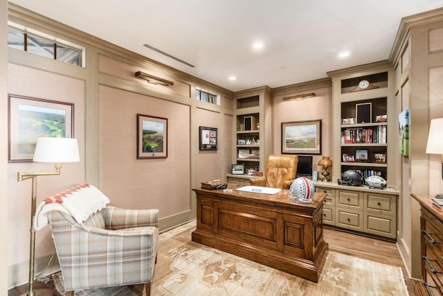 office space with built in features, light wood-style flooring, recessed lighting, visible vents, and ornamental molding