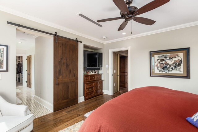 1 Miranova Pl Unit 2230, Columbus, OH 43215 - bedroom featuring crown molding, wood finished floors, a barn door, and visible vents