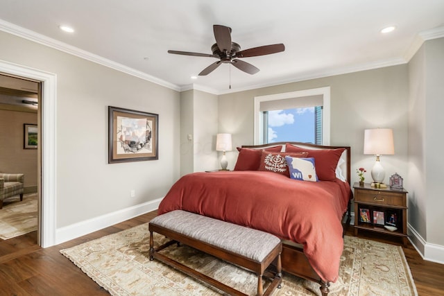 bedroom featuring crown molding, baseboards, and dark wood-style floors