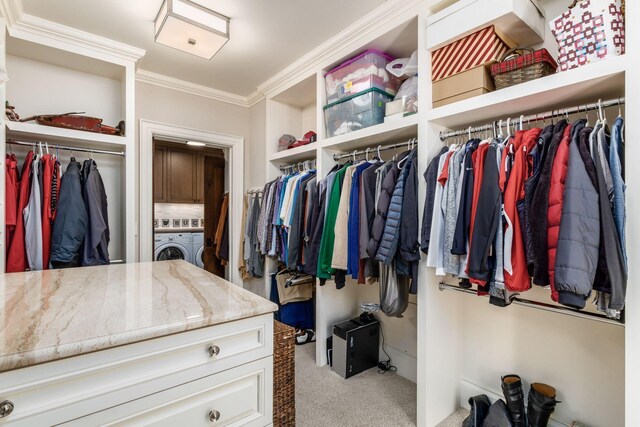 1 Miranova Pl Unit 2230, Columbus, OH 43215 - walk in closet featuring carpet and washing machine and dryer