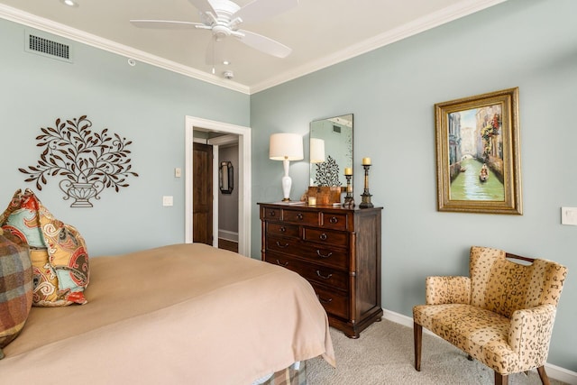 bedroom with visible vents, ornamental molding, baseboards, ceiling fan, and light colored carpet