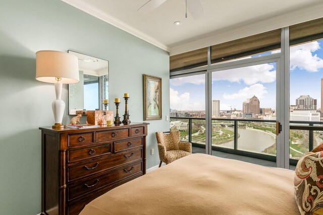1 Miranova Pl Unit 2230, Columbus, OH 43215 - bedroom featuring a ceiling fan, ornamental molding, access to exterior, baseboards, and a city view