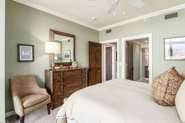 carpeted bedroom with baseboards, visible vents, ornamental molding, and ceiling fan