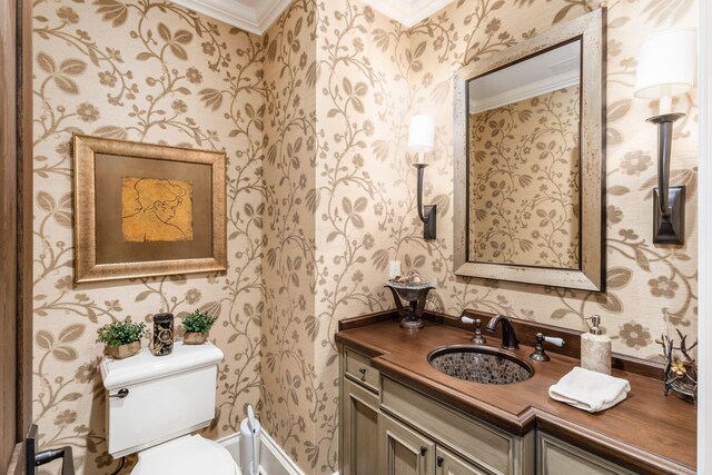 1 Miranova Pl Unit 2230, Columbus, OH 43215 - half bath with crown molding, vanity, toilet, and wallpapered walls