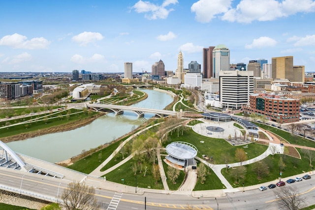 aerial view featuring a view of city and a water view