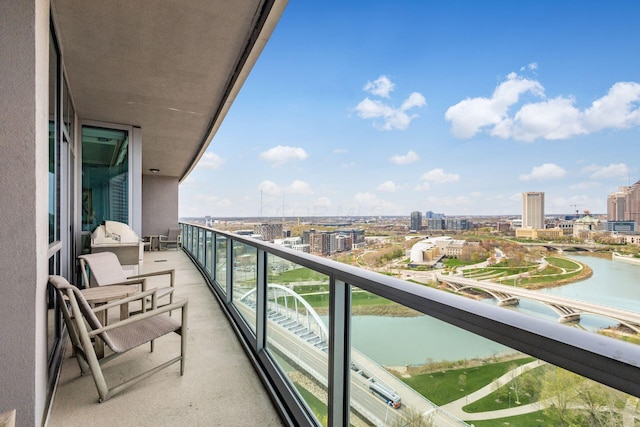 balcony featuring a view of city