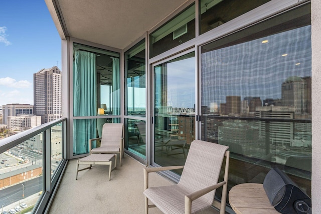 balcony featuring a city view