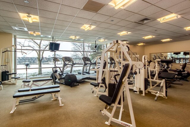 1 Miranova Pl Unit 2230, Columbus, OH 43215 - gym with a healthy amount of sunlight, carpet floors, expansive windows, and visible vents