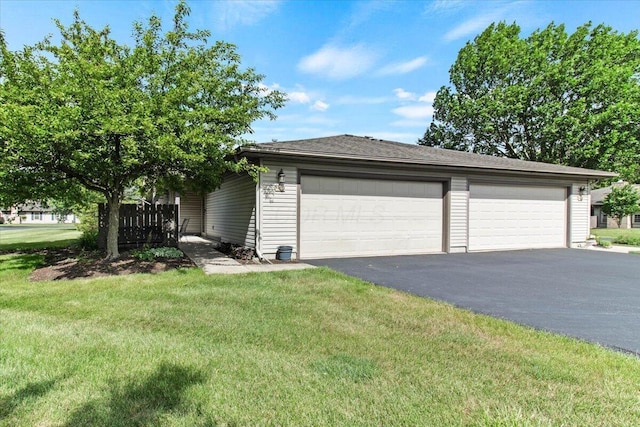 2744 Brittany Oaks Blvd, Hilliard, OH 43026 - view of front of home with asphalt driveway, a garage, and a front yard