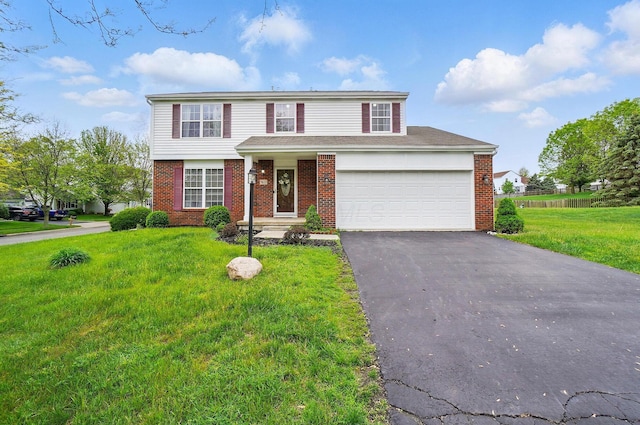 7622 Elgin Trail Dr, Blacklick, OH 43004 - traditional home featuring driveway, brick siding, and a front yard