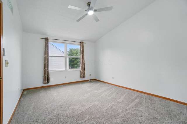 7622 Elgin Trail Dr, Blacklick, OH 43004 - unfurnished room with carpet, visible vents, baseboards, ceiling fan, and lofted ceiling