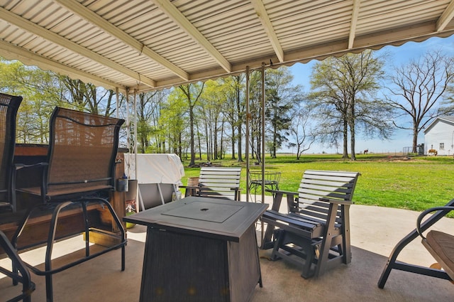 view of patio featuring a fire pit