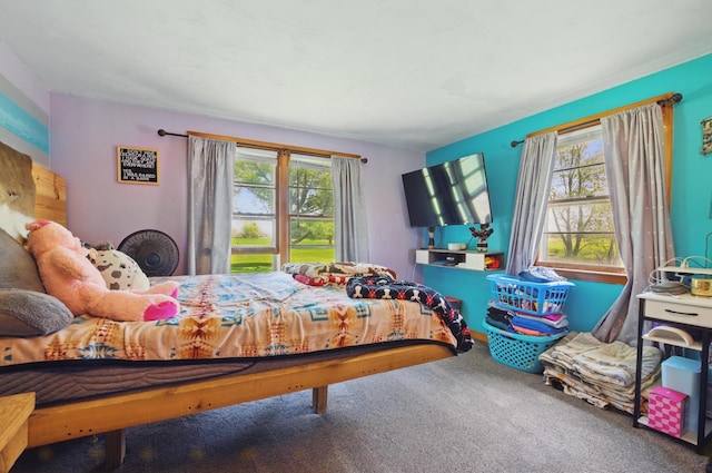 bedroom featuring carpet