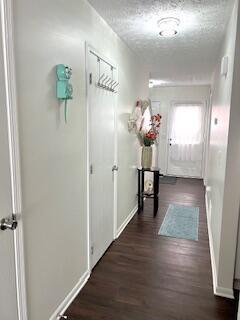 4708 Parrau Dr Unit 60D, Columbus, OH 43228 - corridor featuring baseboards and wood finished floors