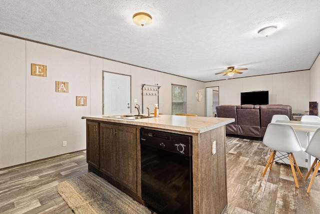 4711 Walnut Rd Lot K-5, Buckeye Lake, OH 43008 - kitchen featuring wood finished floors, a sink, a textured ceiling, and black dishwasher