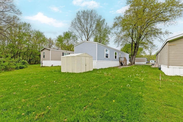 4711 Walnut Rd Lot K-5, Buckeye Lake, OH 43008 - view of yard with a storage unit and an outdoor structure