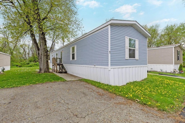 4711 Walnut Rd Lot K-5, Buckeye Lake, OH 43008 - view of side of home with a yard