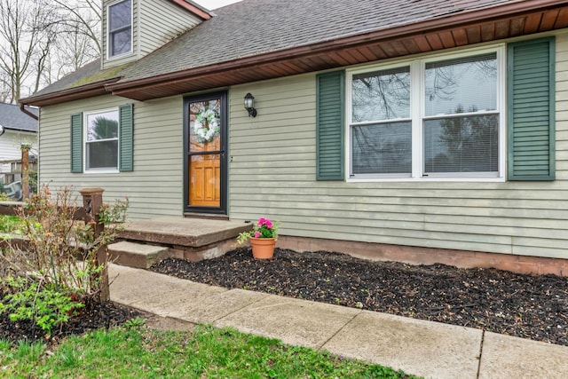 311 Williamsburg Ln NW, Lancaster, OH 43130 - property entrance featuring roof with shingles