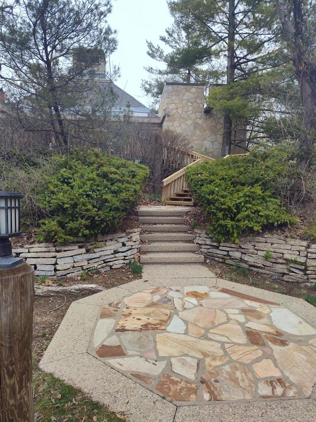 view of yard featuring stairs and a patio