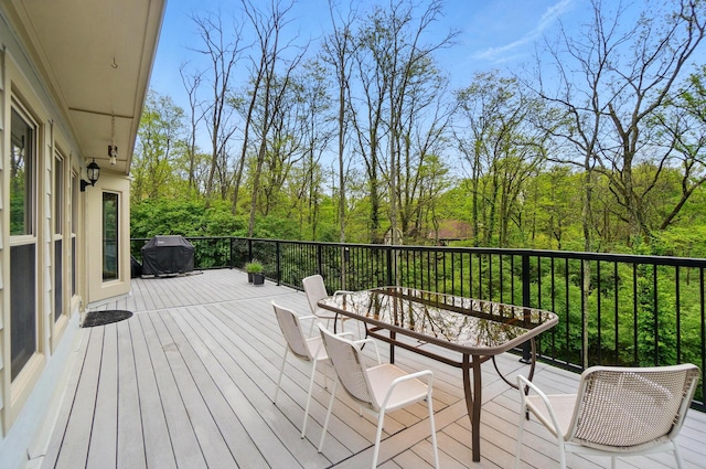 9127 Red Cedar Dr, West Chester, OH 45069 - wooden deck with area for grilling and outdoor dining space
