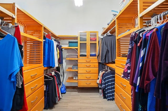 9127 Red Cedar Dr, West Chester, OH 45069 - spacious closet featuring wood finished floors