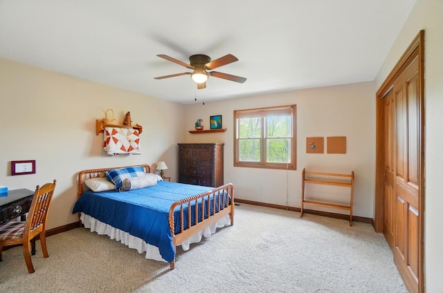 9127 Red Cedar Dr, West Chester, OH 45069 - carpeted bedroom featuring baseboards, a ceiling fan, and a closet