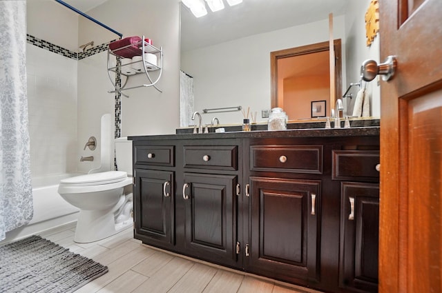 9127 Red Cedar Dr, West Chester, OH 45069 - bathroom featuring double vanity, toilet, a sink, and shower / tub combo with curtain