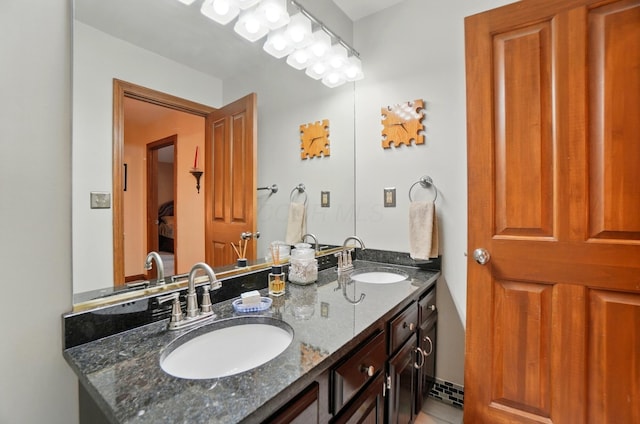 9127 Red Cedar Dr, West Chester, OH 45069 - ensuite bathroom featuring double vanity, a sink, and connected bathroom