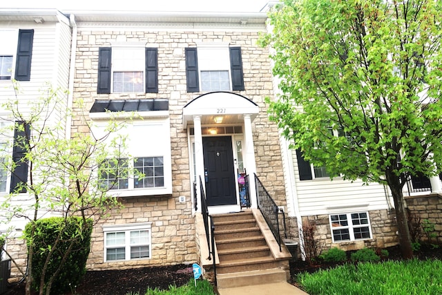 view of front of house featuring stone siding