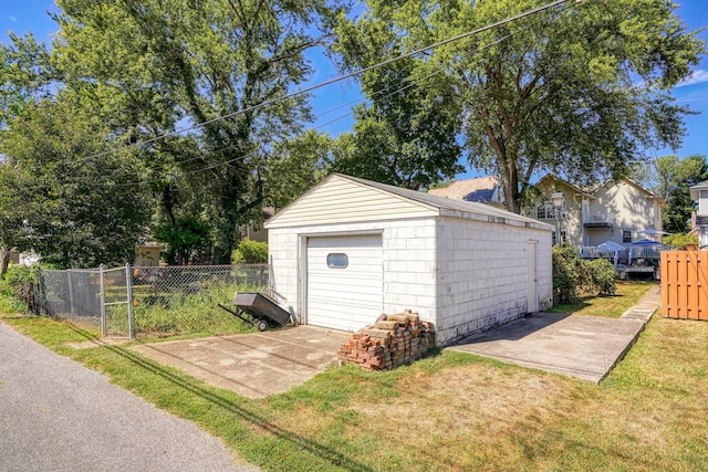 detached garage with fence