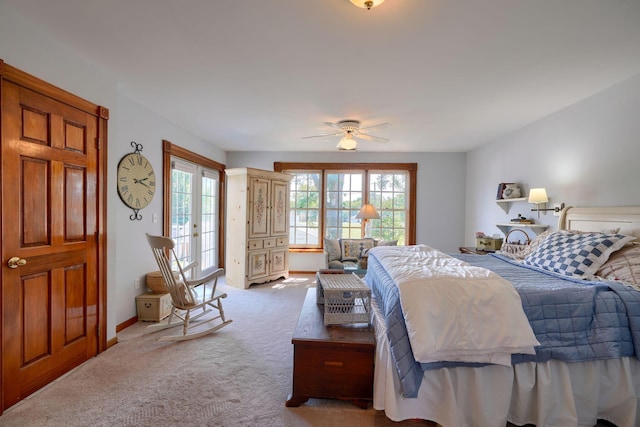 carpeted bedroom with a ceiling fan