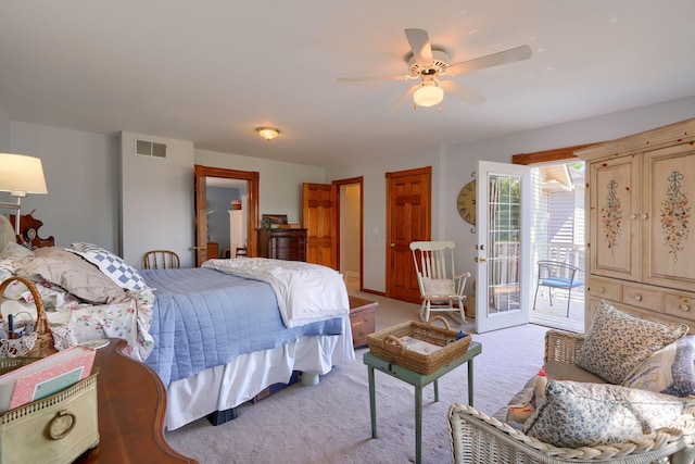 bedroom featuring access to outside, a ceiling fan, light colored carpet, and visible vents