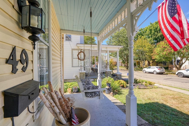 view of patio featuring a porch