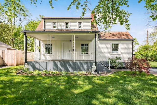 86 Hiawatha Ave, Westerville, OH 43081 - back of property featuring fence, a chimney, board and batten siding, a porch, and a yard