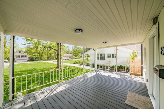 86 Hiawatha Ave, Westerville, OH 43081 - wooden deck featuring a lawn, covered porch, and a residential view