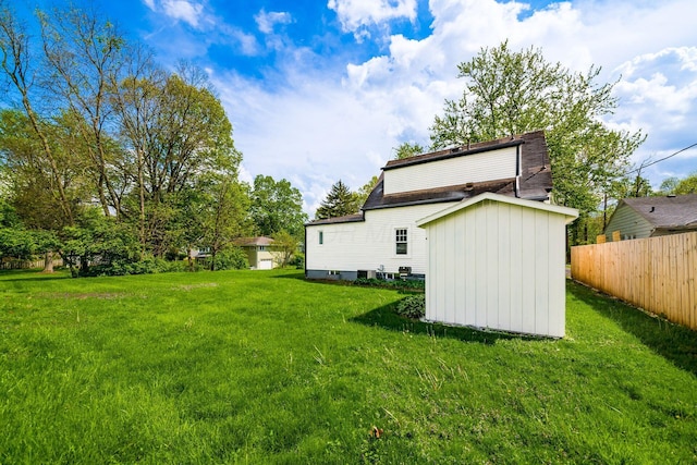 86 Hiawatha Ave, Westerville, OH 43081 - view of yard featuring fence, an outdoor structure, and a shed