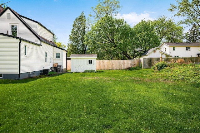 86 Hiawatha Ave, Westerville, OH 43081 - view of yard with central air condition unit, fence, an outbuilding, and a shed