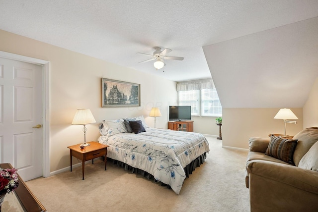 bedroom featuring baseboards, light carpet, and ceiling fan