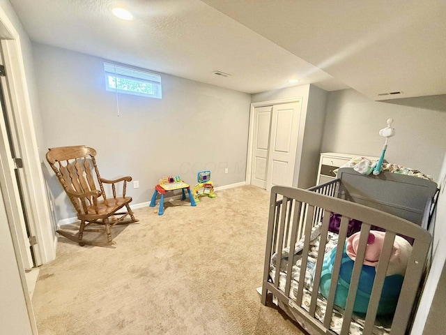 bedroom with carpet floors, recessed lighting, baseboards, and visible vents