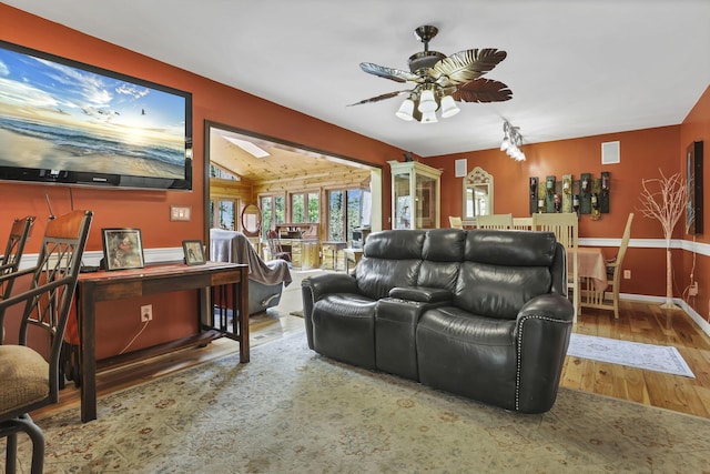 3615 Dragoo Rd, Nashport, OH 43830 - living room with a ceiling fan, wood finished floors, and visible vents