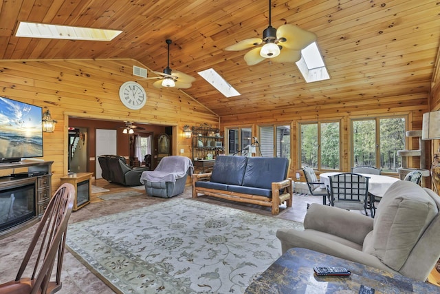 3615 Dragoo Rd, Nashport, OH 43830 - living area with wooden walls, a skylight, and a wealth of natural light