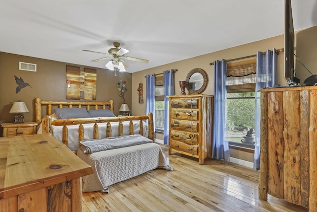 3615 Dragoo Rd, Nashport, OH 43830 - bedroom featuring baseboards, ceiling fan, light wood-type flooring, and visible vents