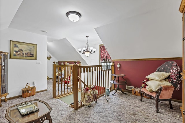 3615 Dragoo Rd, Nashport, OH 43830 - living area featuring vaulted ceiling, a notable chandelier, baseboards, and carpet