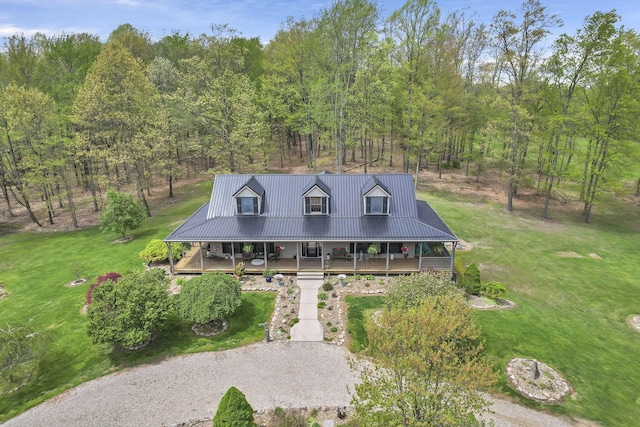 3615 Dragoo Rd, Nashport, OH 43830 - country-style home with a porch, a front lawn, gravel driveway, and metal roof