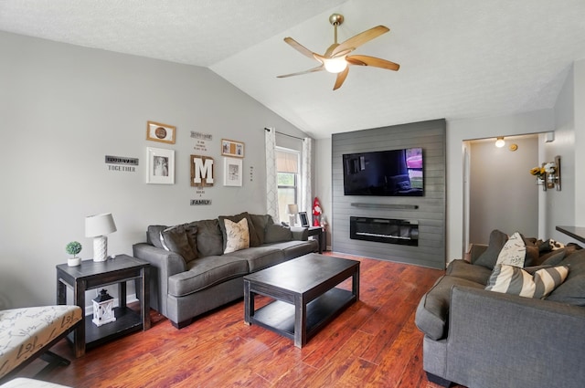 4969 Shannonbrook Dr, Columbus, OH 43221 - living area with a ceiling fan, wood finished floors, vaulted ceiling, and a large fireplace