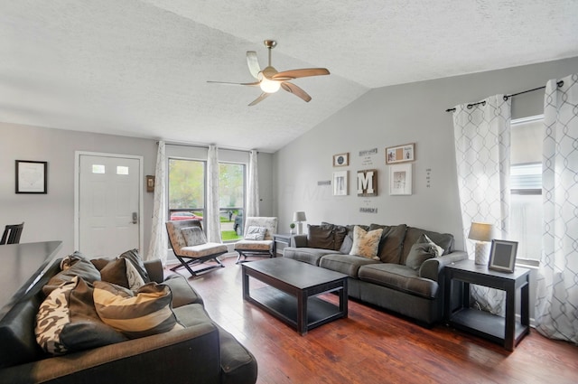 4969 Shannonbrook Dr, Columbus, OH 43221 - living area featuring vaulted ceiling, a ceiling fan, dark wood-style flooring, and a textured ceiling