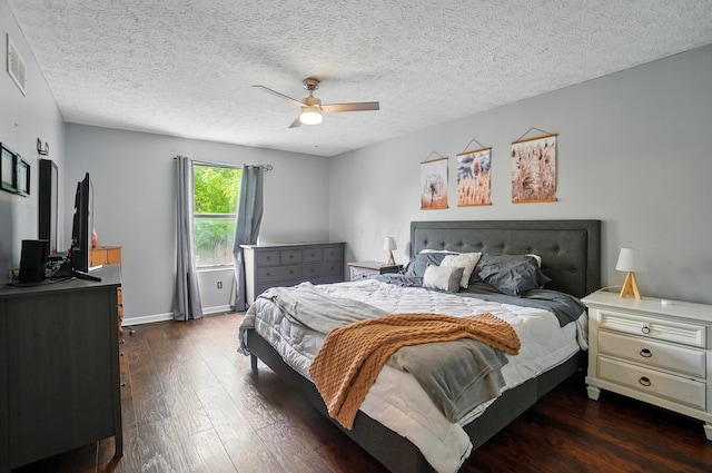 4969 Shannonbrook Dr, Columbus, OH 43221 - bedroom with ceiling fan, a textured ceiling, baseboards, visible vents, and dark wood-style floors