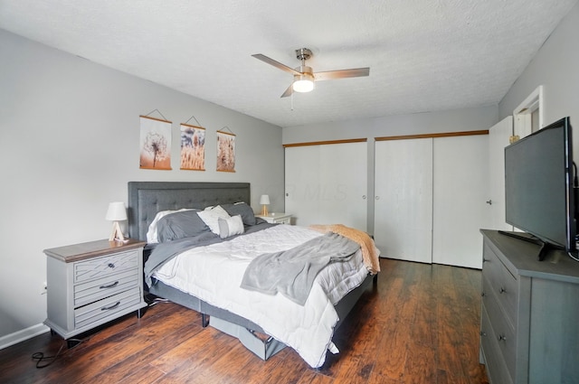 4969 Shannonbrook Dr, Columbus, OH 43221 - bedroom with a ceiling fan, multiple closets, and wood finished floors